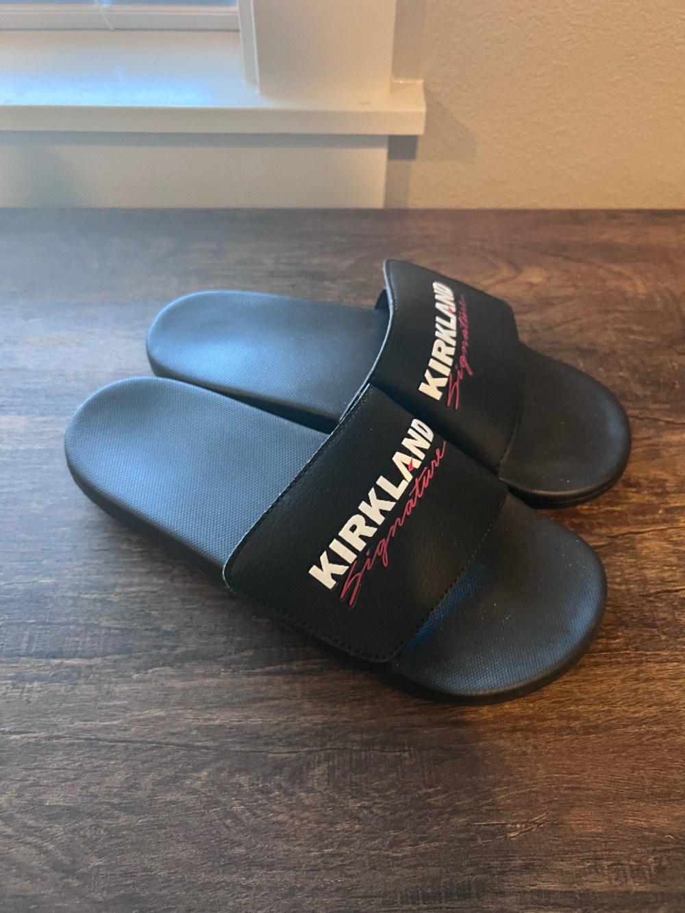 Costco Kirkland Signature Slides - Size 7 Women's. Never worn. Color Black.